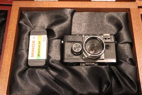 A cased Minox Leica miniature camera, a Minox glass, Contax 1 and a Minox Classic Leica III (3)